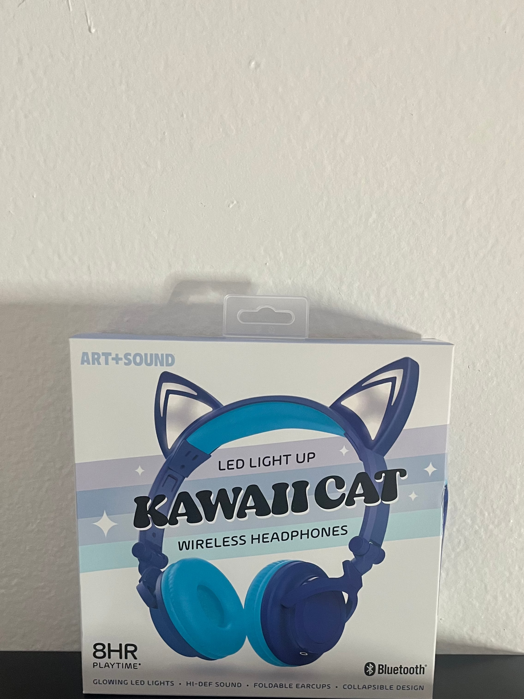 Kawaii Cat wireless headphones packaging on a white surface