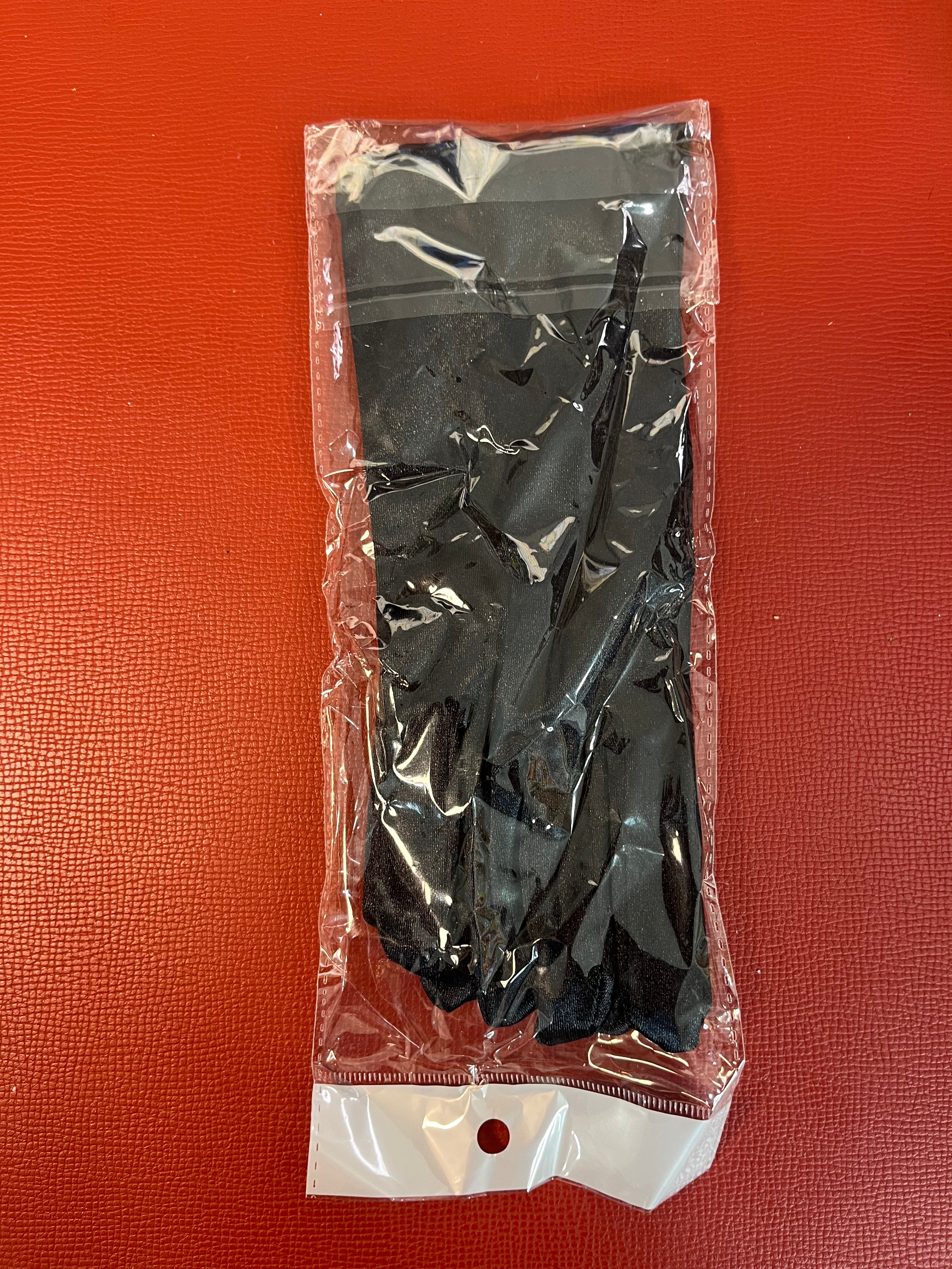Woman’s black gloves