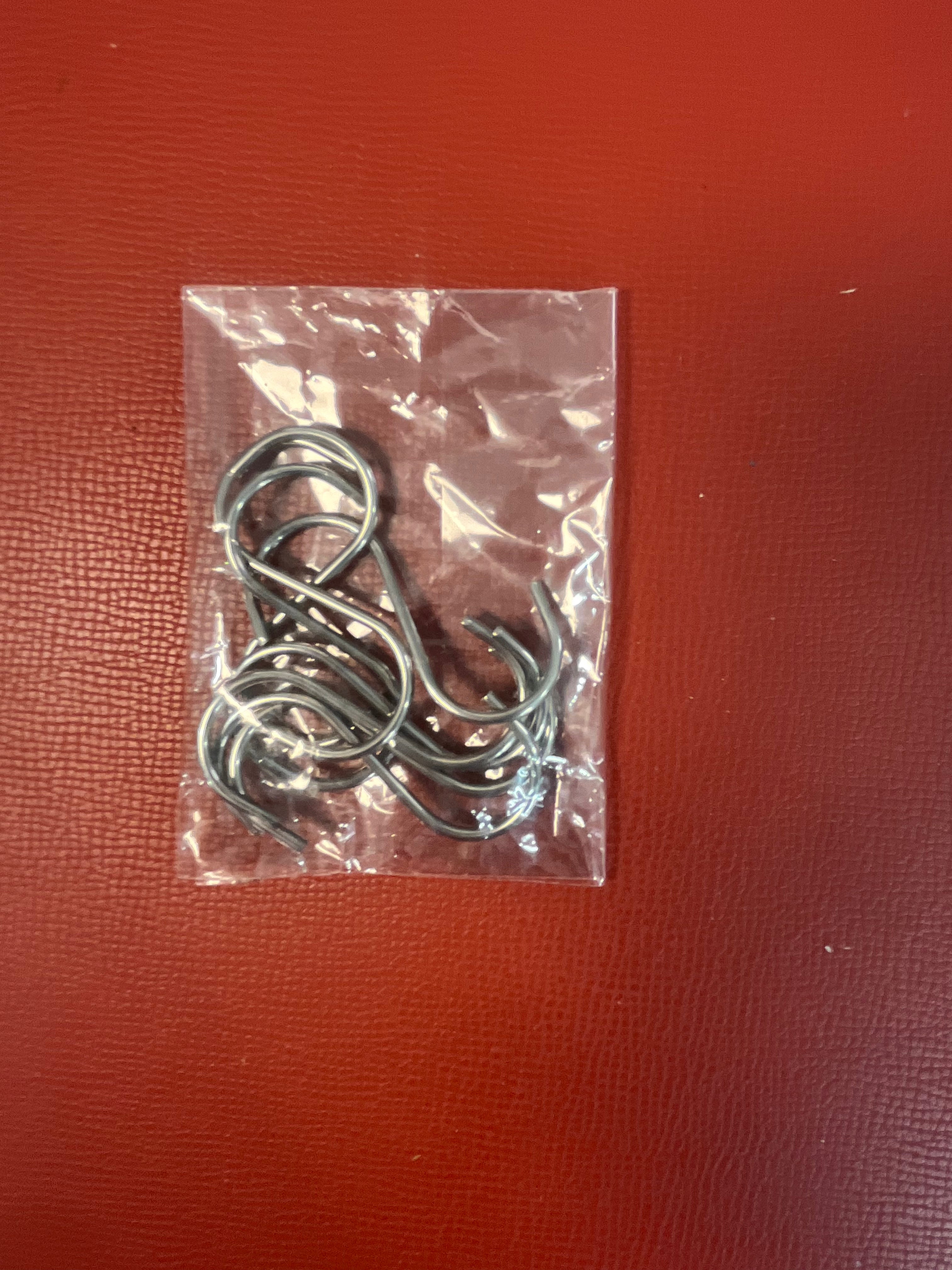 Hooks buckles and fasteners